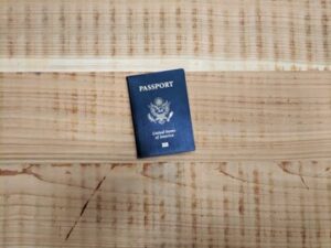 a passport on a wooden surface